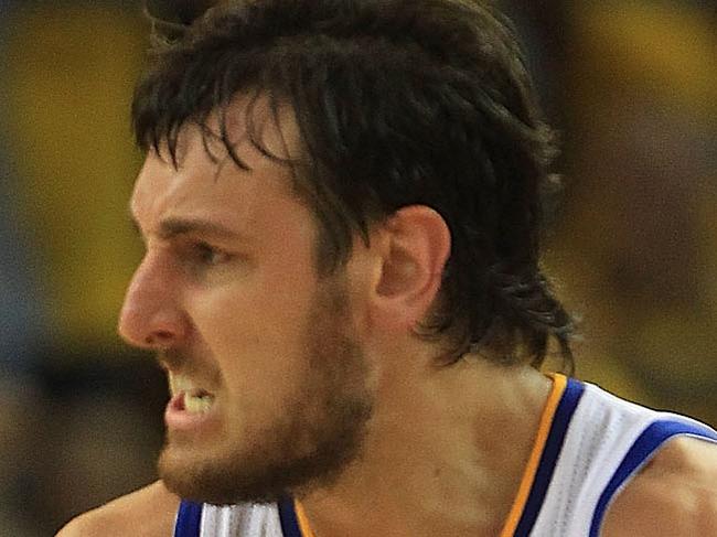 OAKLAND, CA - APRIL 28: Andrew Bogut #12 of the Golden State Warriors celebrates against the Denver Nuggets during Game Four of the Western Conference Quarterfinals of the 2013 NBA Playoffs at ORACLE Arena on April 28, 2013 in Oakland, California. NOTE TO USER: User expressly acknowledges and agrees that, by downloading and or using this photograph, User is consenting to the terms and conditions of the Getty Images License Agreement. (Photo by Jed Jacobsohn/Getty Images)