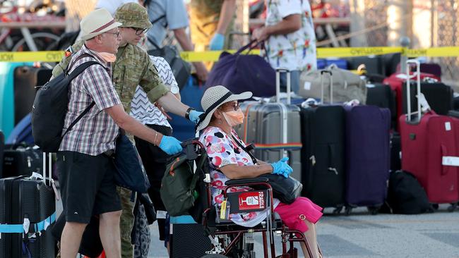 Passengers from the cruise ship Vasco da Gama disembark from a Rottnest Express ferry at Fremantle harbour after completing their quarantine period on Rottnest Island.