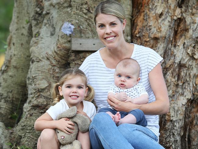 Northern beaches mum Ashley Conde, pictured with her kids, believes her happiness at work flows onto the whole family. Picture: Danny Aarons