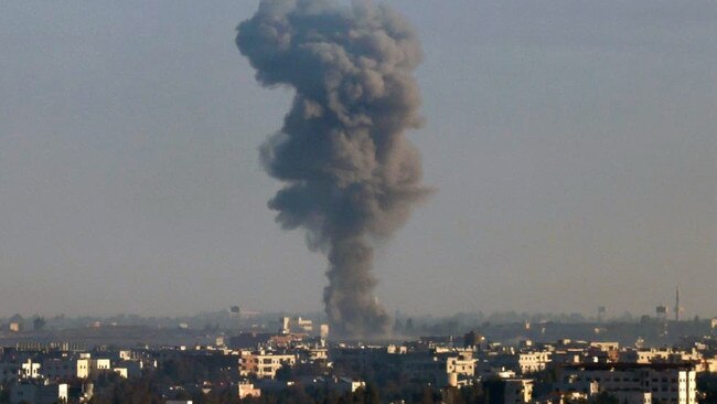 Smoke rising over an area of Syria near the Israeli-held Golan Heights on Monday. Picture: Getty Images.