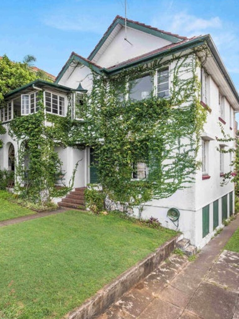 The exterior of the home, which appears to be a house but is rented as five separate units.