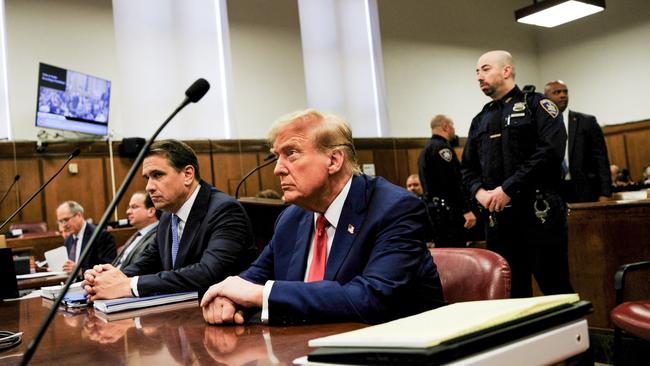 Donald Trump attends his trial for allegedly covering up hush money payments linked to extramarital affairs, at Manhattan Criminal Court in New York City. Picture: AFP.