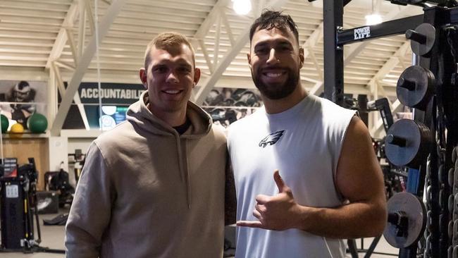 Manly Sea Eagles fullback Tom Trbojevic and Australian NFL lineman Matthew Leo, who is on the practice squad of the Philadelphia Eagles.