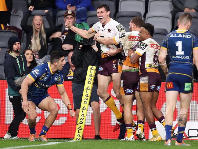 Corey Oates of the Broncos celebrates scoring a try during the round 19 NRL match against the Parramatta Eels. Picture: Cameron Spencer/Getty Images