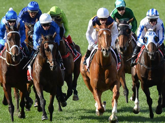 Jockey Damian Oliver on Happy Clapper (left rear) rides into jockey Dean Yendall on Royal Symphony  during the Cox Plate Day at Moonee Valley Racecourse in Melbourne, Saturday, October 28, 2017. (AAP Image/Mal Fairclough) NO ARCHIVING, EDITORIAL USE ONLY