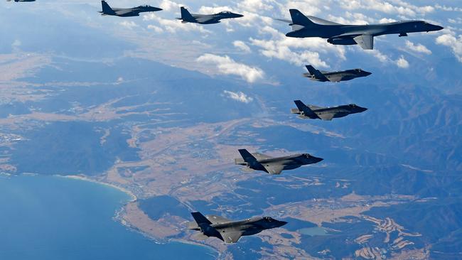 South Korean and US fighter jets fly over the Korean Peninsula during the Vigilant Ace air combat exercise earlier this month. Picture: South Korean Defense Ministry/Getty Images