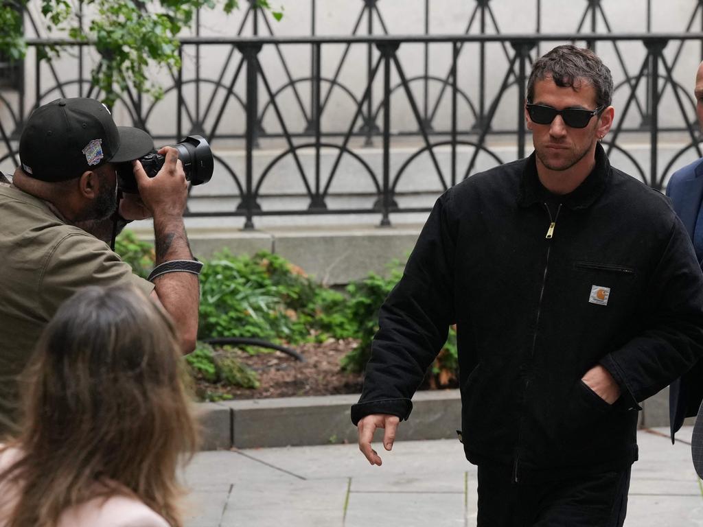 Alex Fine (2nd R), Casandra Ventura's husband, arrives at Manhattan Federal Court. Picture: AFP