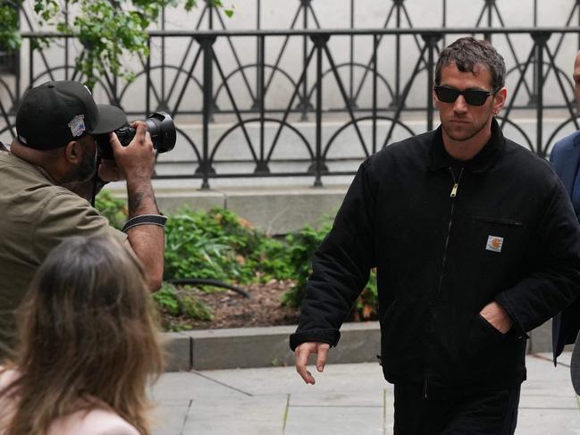 Alex Fine (2nd R), Casandra Ventura's husband, arrives at Manhattan Federal Court. Picture: AFP