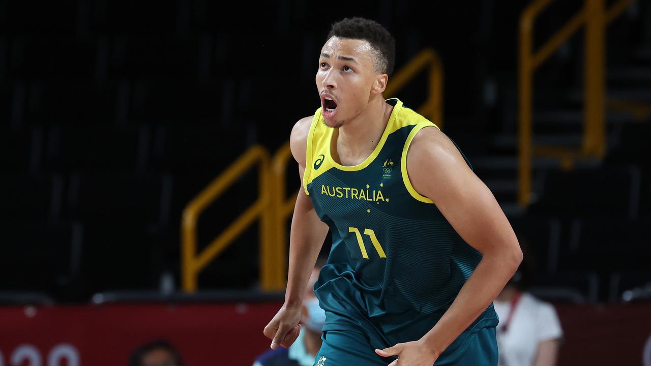 SAITAMA, JAPAN - AUGUST 07: Dante Exum #11 of Team Australia celebrates against Team Slovenia during the second half of the Men's Basketball Bronze medal game on day fifteen of the Tokyo 2020 Olympic Games at Saitama Super Arena on August 07, 2021 in Saitama, Japan. (Photo by Kevin C. Cox/Getty Images)
