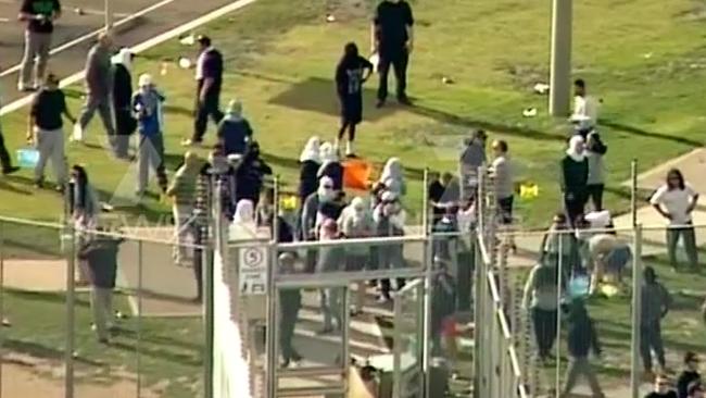 Some prisoners protected their identity during the riot. Picture: 7 News