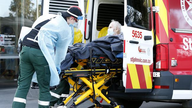 A resident of Epping Gardens Aged Care is transferred to hospital by ambulance. Picture: Getty Images