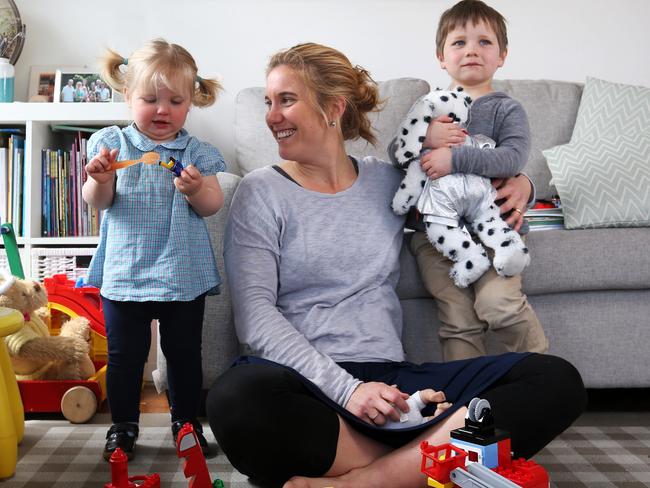 Emily Isham with children L-R Eleanor 18 months and Ned 4 at home in Kingston. Kingborough GP Emily Isham grew up in the Congo with her two missionary parents which inspired her to become a doctor to help those in the third world. Her son Ned 4 has since been diagnosed with leukaemia. Picture: NIKKI DAVIS-JONES