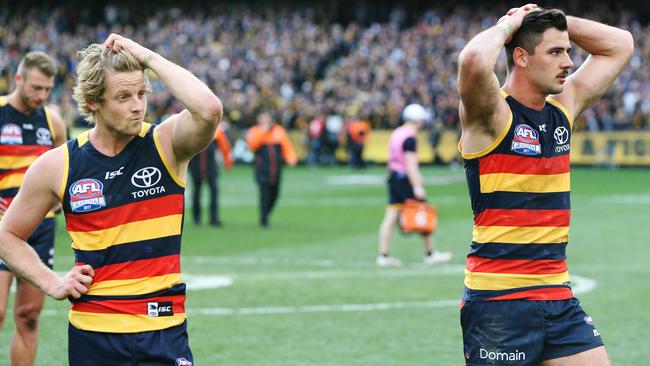 Crows Rory Sloane and Taylor Walker after the 2017 Grand Final.