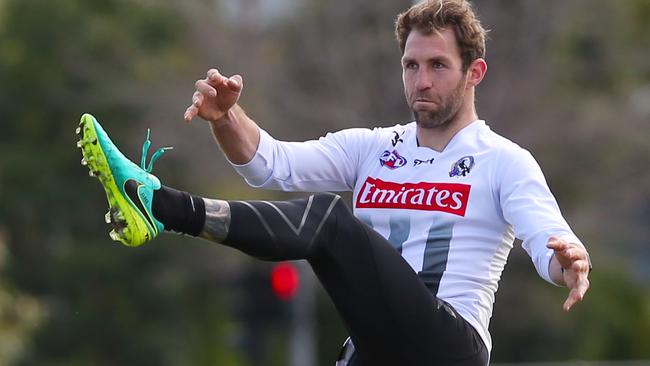 Travis Cloke practices his goalkicking at training on Thursday. Picture: David Crosling