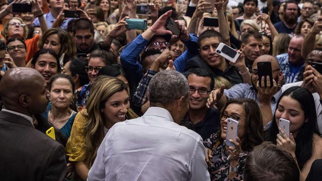 Former US President Barack Obama greets the crowd during a Democratic Congressional Campaign Committee rally. Picture: Getty