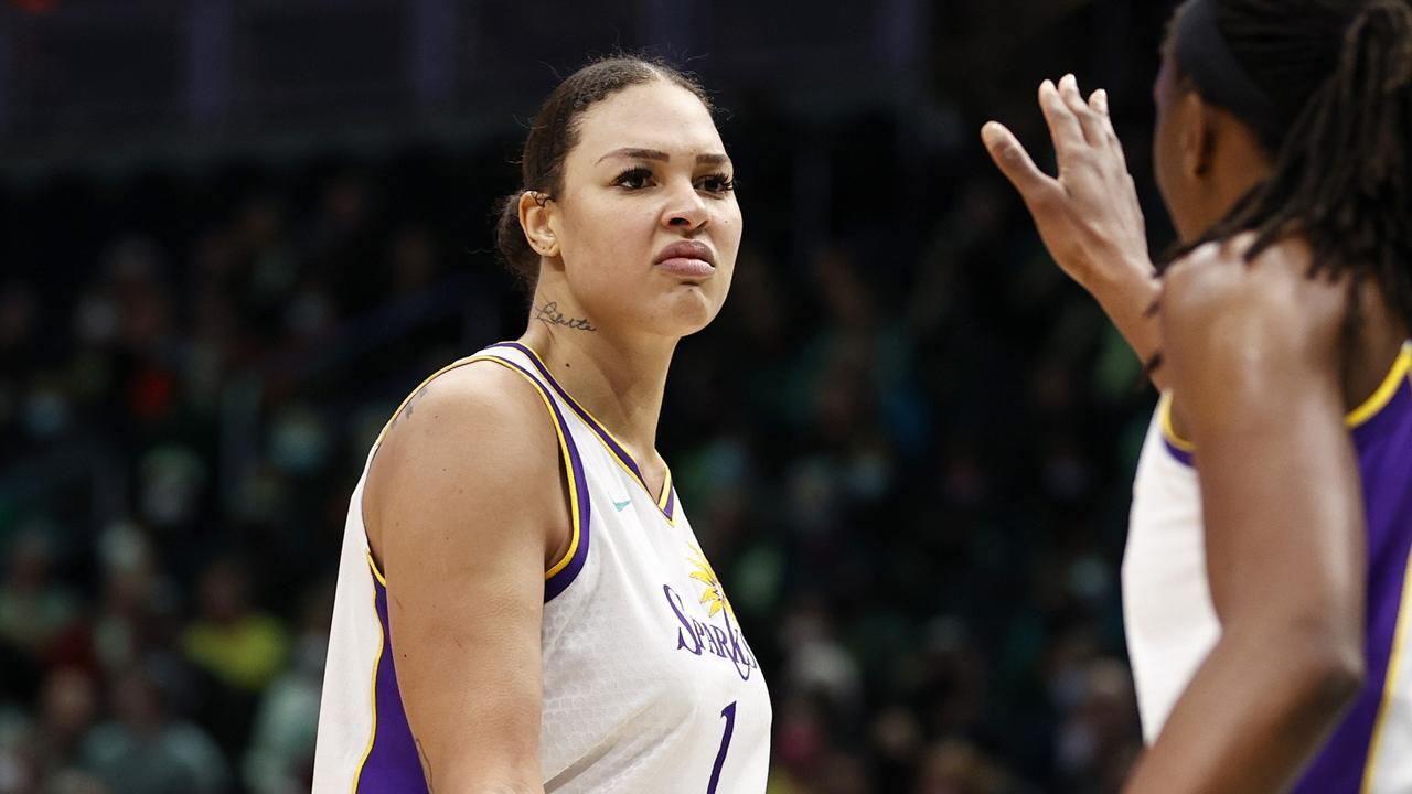 SEATTLE, WASHINGTON - MAY 20: Liz Cambage #1 and Nneka Ogwumike #30 of the Los Angeles Sparks react against the Seattle Storm during the second half at Climate Pledge Arena on May 20, 2022 in Seattle, Washington. NOTE TO USER: User expressly acknowledges and agrees that, by downloading and or using this photograph, User is consenting to the terms and conditions of the Getty Images License Agreement. (Photo by Steph Chambers/Getty Images)