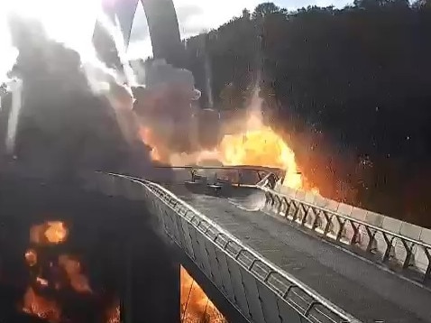 A screen grab taken from a surveillance camera shows an explosion rocked a bridge in the Shevchenkivskyi district of the Ukrainian capital, Kyiv. Picture: AA Video/Anadolu Agency via Getty Images