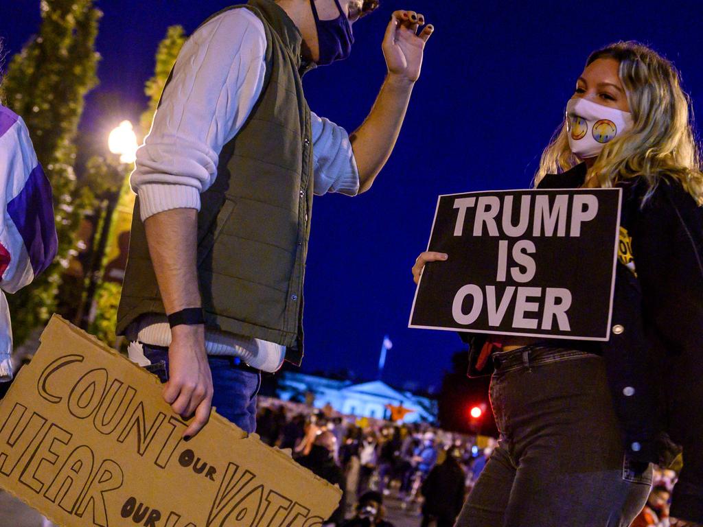 Young activists outside of the White House on Wednesday night. Picture: Eric Baradat/AFP