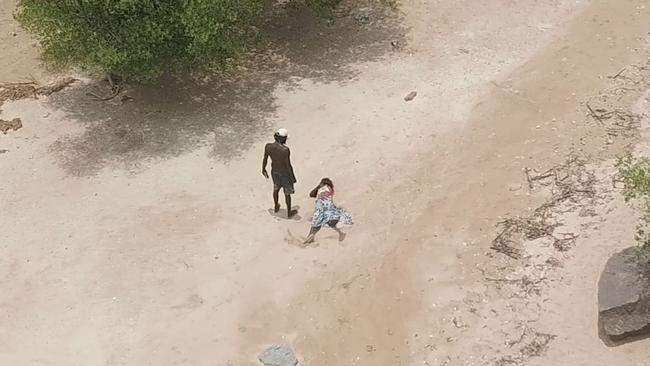 A brutal assault has been captured by a drone pilot at Buffalo Creek, north of Darwin. Picture: SUPPLIED