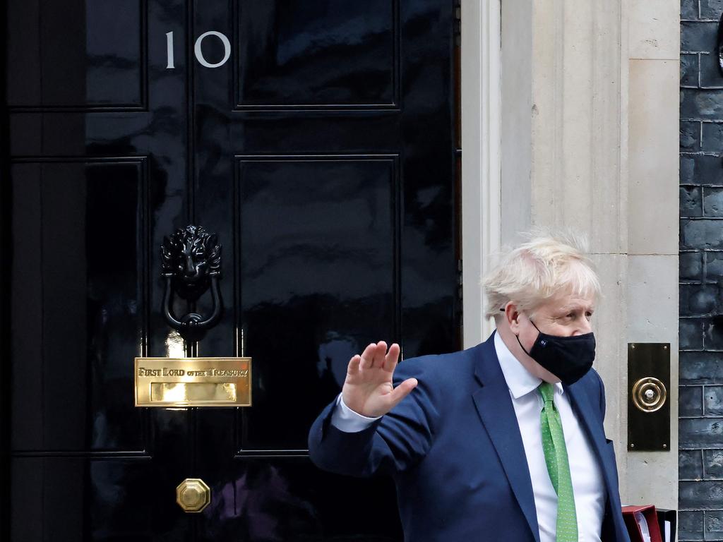 Boris Johnson, wearing a face covering to help mitigate the spread of coronavirus, has come under fire for an “inconsistent” approach to the pandemic. Picture: AFP