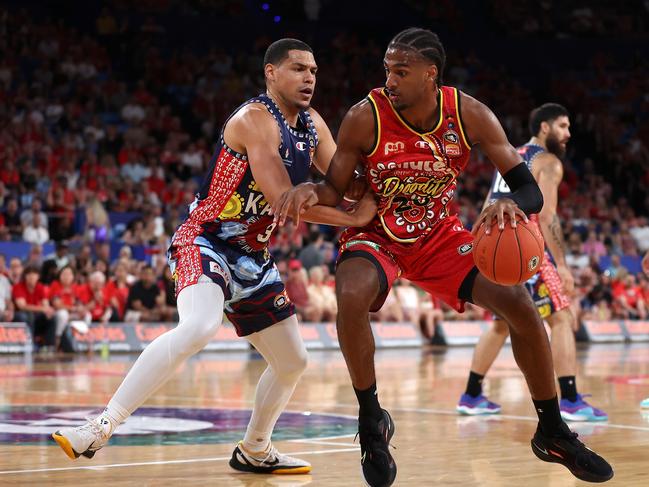 Alex Sarr of the Wildcats controls the ball against Trey Kell. Picture: Paul Kane/Getty Images