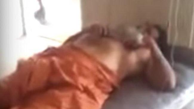 Footage emerged of the ‘attacker’ writhing in pain on a hospital bed after losing his privates