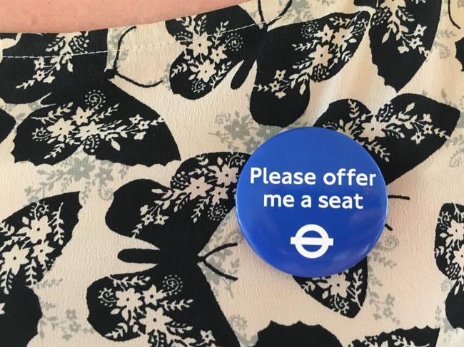 The "Please offer me a seat" badge used on London’s public transport networks. Supplied: Transport for London