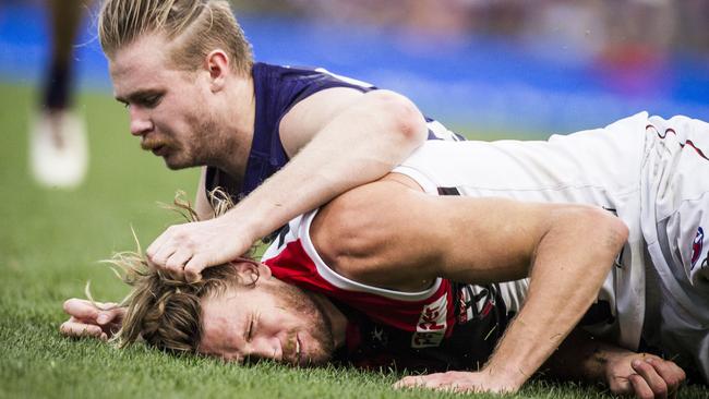 Cam McCarthy could be in trouble for a dangerous tackle on Sam Gilbert, which knocked out the Saint. Picture: AAP