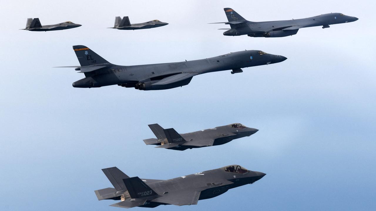 US Air Force B-1B strategic bombers, South Korean Air Force F-35 fighters and USAF F-22 stealth fighters in a joint drill this month. Picture: AFP/South Korean Defence Ministry