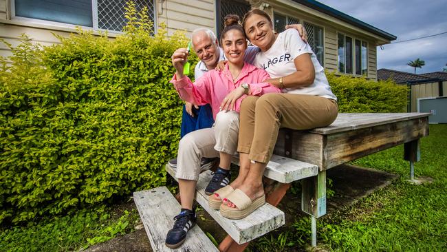 Alexis Iacovou at her Woodridge property with her parents Loizos and Georgina who stepped in as guarantors for her loan in order for it to be approved. Picture: Nigel Hallett