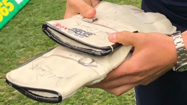 Jonny Bairstow with the gloves of his late father. (Photo: Matt Clinch, ABC)