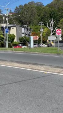 Powerlines snap over busy Gold Coast intersection