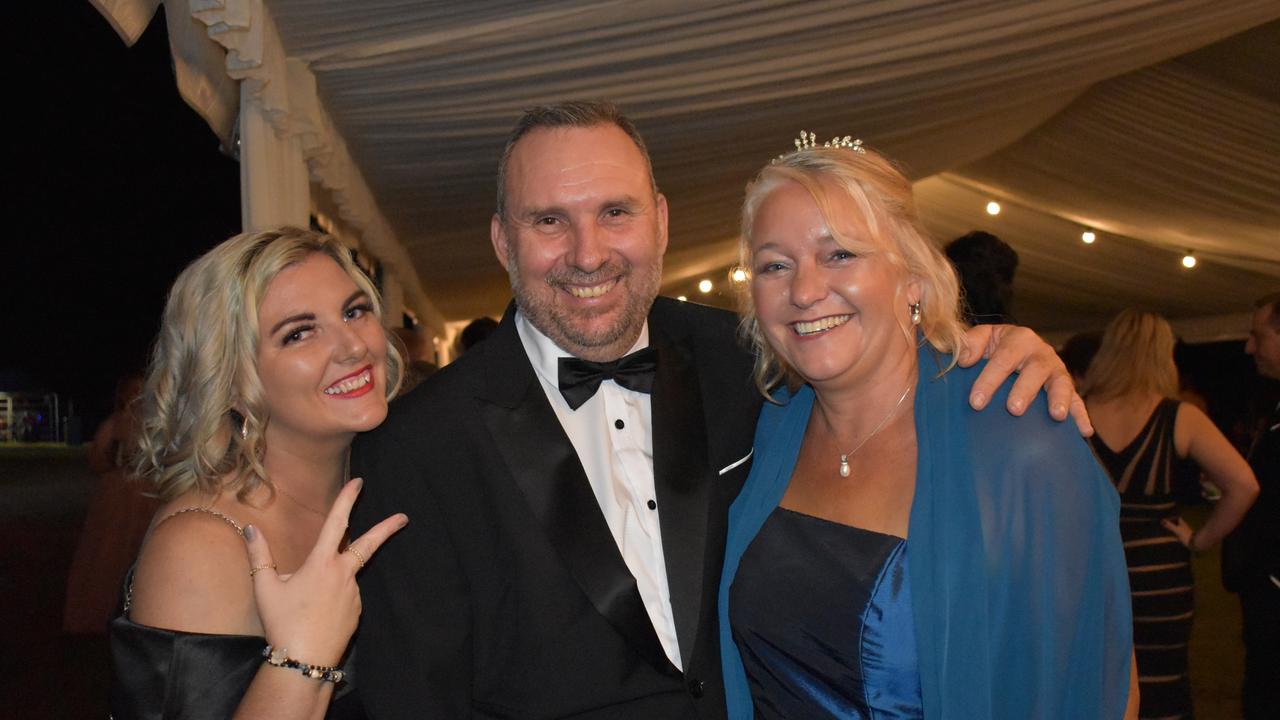 Jess Davies of Midge Point, Craig Mcdougall of Proserpine, and Christine Auld of Proserpine at the 2021 Proserpine Show Ball. Picture: Kirra Grimes.