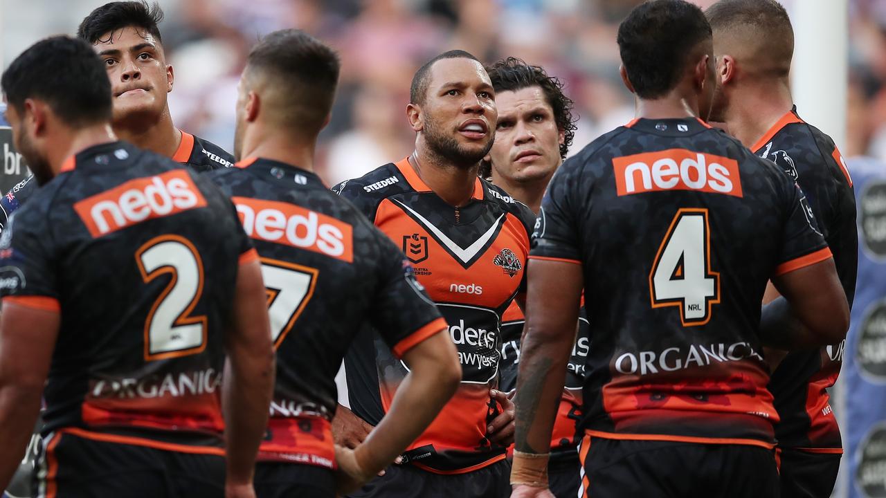 Moses Mbye of the Tigers and teammates look on after losing to Manly