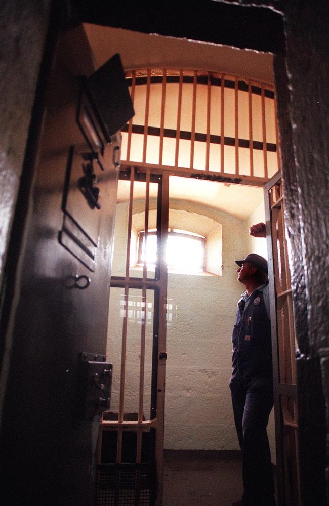 A prison officer standing in Pentridge Prison's now closed H division where Ronald Ryan spent last days in a death cell prior to his hanging in 1967.