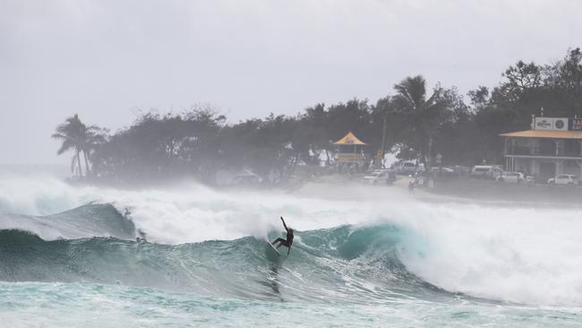 Surfers at Snapper Rocks and Kirra riding the Large swell produced by Cyclone OMA. Photograph : Jason O'Brien