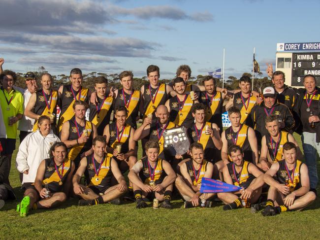 Kimba Districts 2019 premiers Eastern Eyre Football LeagueBack from left: Trainer Shane Hannan, runner Josh Vandeleur, runner Jeff Koch, Shannan Larwood, Matthew Vandeleur, Max Ramsey, Bailey Francis, Thomas Klingberg, Nick Collins, Jesse Kemp, David Dunbar, Dylan Bone, Assistant Coach Brad Woolford, Coach Matt Lienert, Assistant Coach Mark Enright.Middle: Trainer Kirsty Gregory, Ryley Maitland, Brook Seal, Captain Joel Fitzgerald, Nathan Ryan, Darcy Noll, Reece Rasyon.Front: Team Manager Daniel Horgan, Andrew Vandeleur, Dion Woolford, Bryce Hampel, Dale Rayson, Zane Stutley and Ben Clements,Eastern Eyre Football Final - Kimba Districts v Eastern Ranges on Saturday 7th Sept 2019 - picture Kerri Cliff, Fresh Eyre Photography