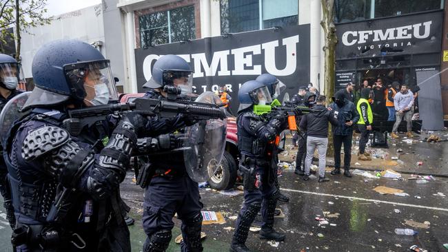 A demonstration explodes at CFMEU headquarters two days after the Richmond protests. Picture: David Geraghty