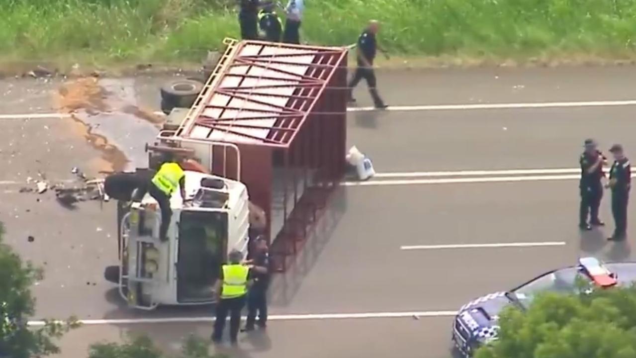 The truck involved in the accident overturned at the scene on the Cunningham Highway. Picture: 9 News