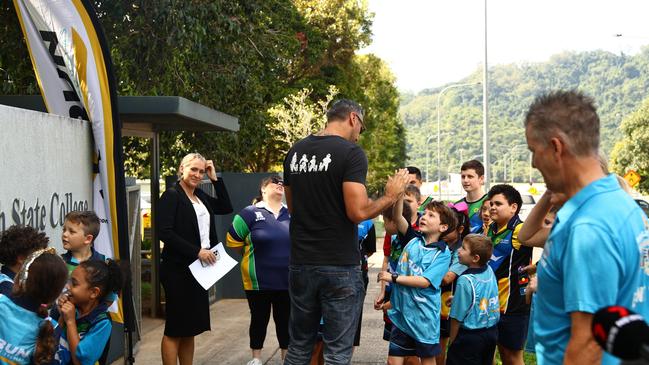 MP elect for Leichhardt Matt Smith high-fiving a Redlynch State School student. Picture: Elodie Jakes