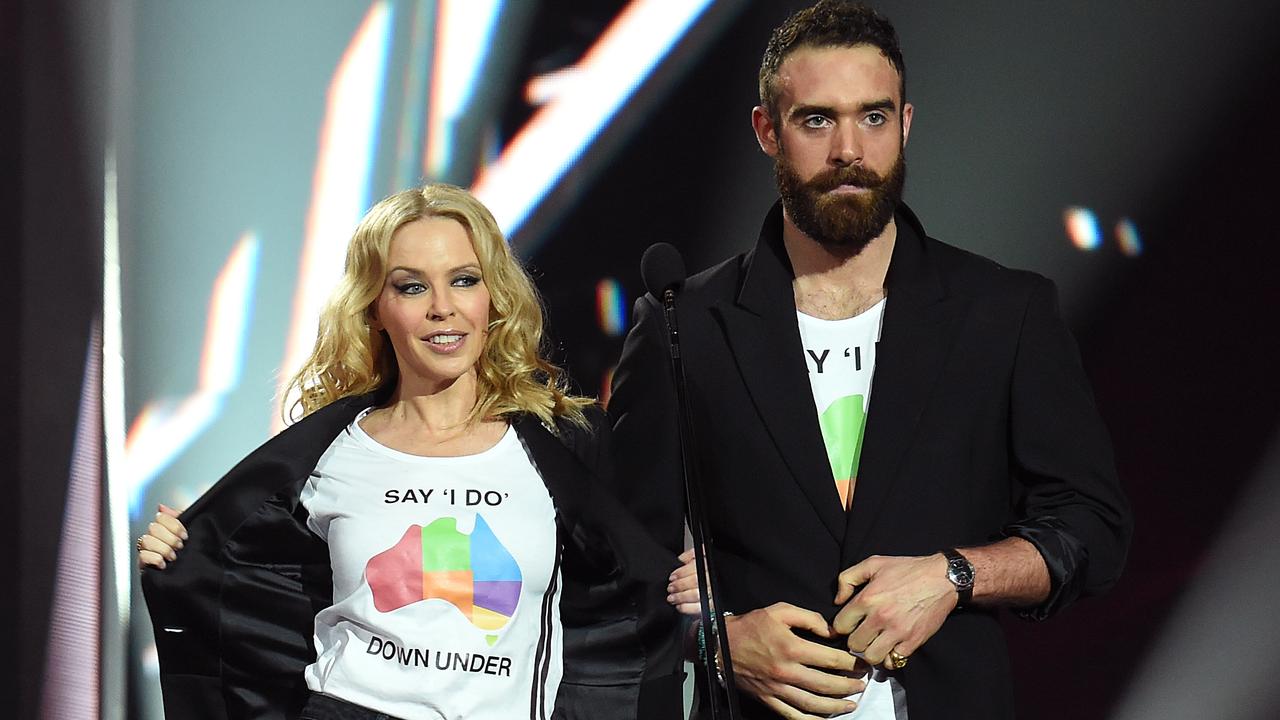 Kylie Minogue and Joshua Sasse onstage at the 2016 ARIAs. Picture: AAP