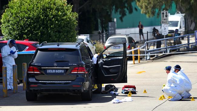 Police examine the scene of the 2018 shooting. Picture: Toby Zerna