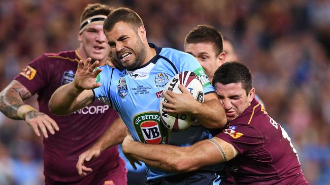 Wade Graham of the NSW Blues takes the ball up during Game 1 of the State of Origin series at Suncorp Stadium in Brisbane, Wednesday, May 31, 2017. (AAP Image/Dave Hunt) NO ARCHIVING