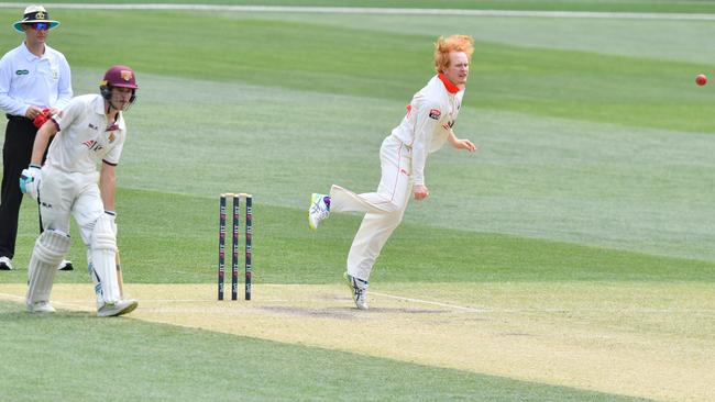 Lloyd Pope of the Redbacks in full flight against Queensland at Adelaide Oval. Picture: AAP Image/David Mariuz