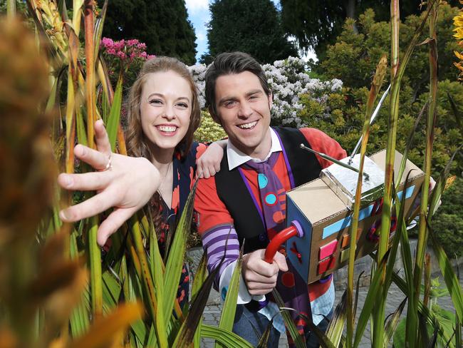 Performer Imogen Moore and children's entertainer, Jimmy Giggle searching for Santa in the Royal Tasmanian Botanical Gardens ahead of co-hosting this Christmas' Carols By Candlelight Picture: LUKE BOWDEN