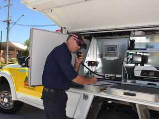 NEW COMMAND: Rural Fire Service Warwick Group Deputy Officer Malcolm Stacey demonstrates the command and communications capacity of the new Warwick 91 command vehicle. Photo Jayden Brown / Warwick Daily News. Picture: Jayden Brown