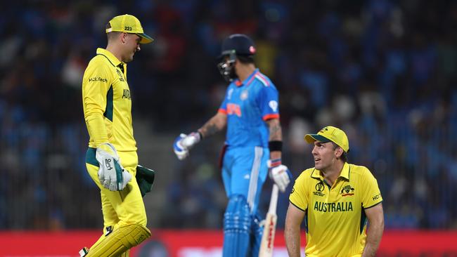 Mitch Marsh reacts with Alex Carey after dropping a catch from Virat Kohli. (Photo by Robert Cianflone/Getty Images)