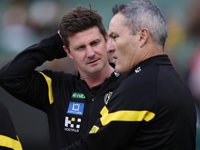 MELBOURNE, AUSTRALIA - MAY 28, 2023 :  AFL Round 11. Richmond vs Port Adelaide at the MCG . Richmond caretaker coach Andrew McQualter with footy boss Tim Livingstone at qtr time  .  Pic: Michael Klein