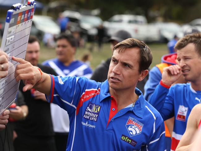 Luke McCormick delivers a message to his group. Picture: Stuart Milligan