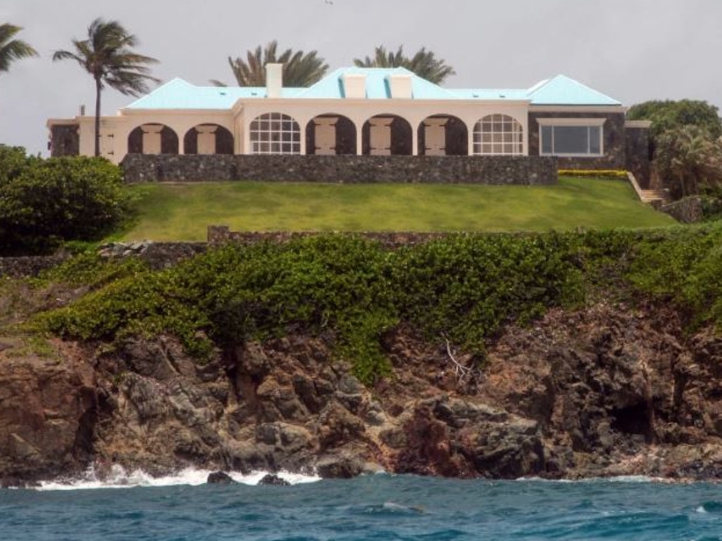 An enormous cream-coloured mansion with a turquoise roof was built on the sprawling island.